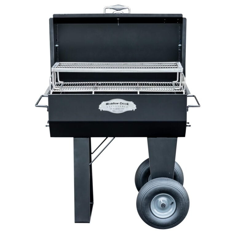 A front view of the Meadow Creek PR36 pig roaster with both the upper and lower racks visible, highlighting the grill's spacious design.