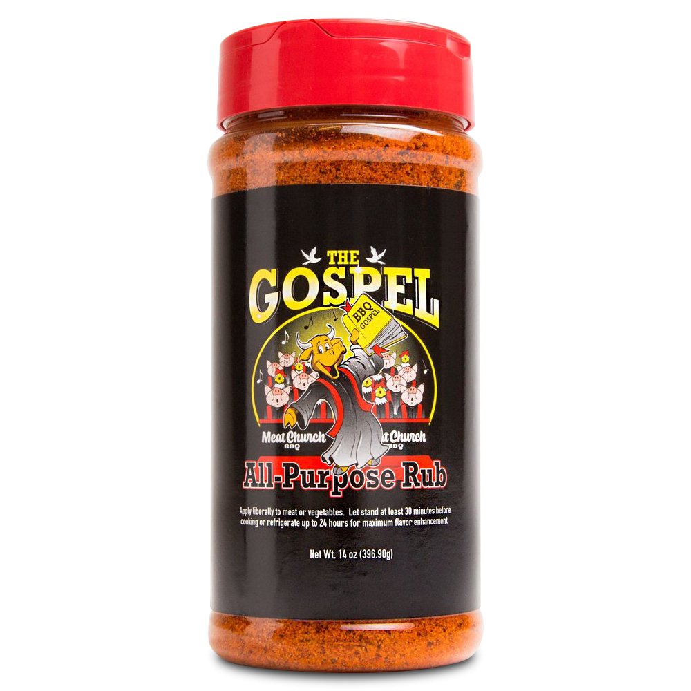 A 14-ounce bottle of The Gospel All Purpose Rub by Meat Church BBQ, featuring a red cap and a black label with a cartoon preacher holding a BBQ gospel book.