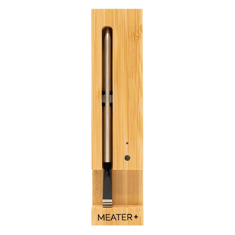 MEATER Plus wireless meat thermometer in a wooden box, featuring a sleek design for precise BBQ and grilling temperature monitoring