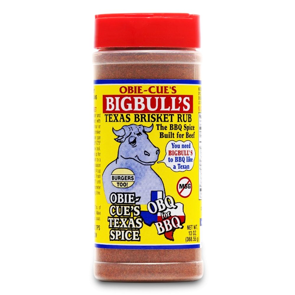 Front view of Obie-Cue's Big Bull's Texas Brisket Rub bottle. The label features a cartoon bull and highlights the product as a Texas BBQ spice specifically for beef, with additional notes on its suitability for burgers and absence of MSG.