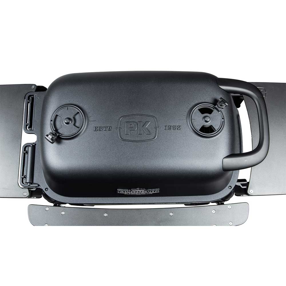 Top view of a PK Franklin charcoal grill with a black lid, showing the brand logo and two air vents for controlling the temperature.