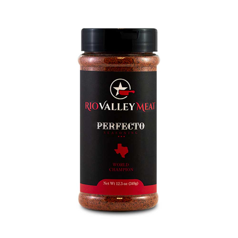 A 12.3 oz plastic bottle of Rio Valley Meat Perfecto Seasoning. The bottle has a black label with red and white text, featuring a white star and red chili pepper logo at the top, followed by the brand name 'Rio Valley Meat.' Below it, 'Perfecto Seasoning' and 'World Champion' are written. The bottom part of the label states the net weight as 12.3 oz (349g). The seasoning inside the bottle is reddish-brown in color.
