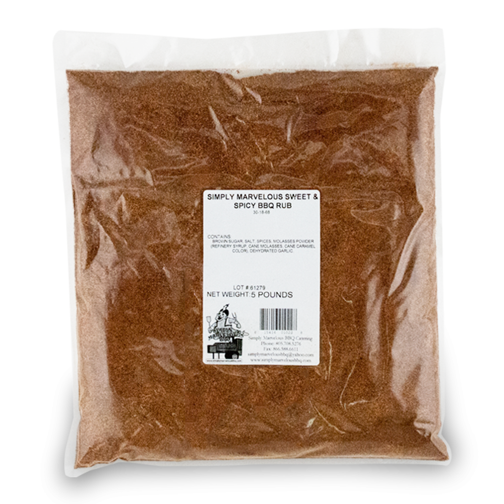 A large, clear plastic bag filled with a reddish-brown seasoning labeled 'Simply Marvelous Sweet & Spicy BBQ Rub.' The label lists ingredients including brown sugar, salt, spices, molasses powder, maple sugar, cane molasses, caramel, and dehydrated garlic. The net weight is 5 pounds. The label also features a barcode and the Simply Marvelous BBQ & Catering contact information.