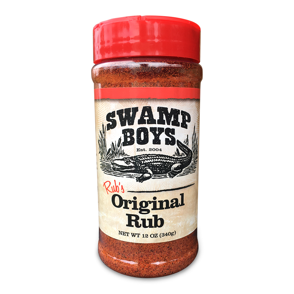 The front of a container of Swamp Boys BBQ Rub with a red cap. The label features the brand name "Swamp Boys" with an illustration of an alligator and reeds, along with the product name "Rub's Original Rub" and the net weight of 12 oz (340g).
