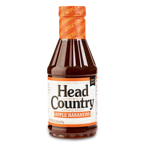 Bottle of Head Country Apple Habanero BBQ Sauce, featuring a label that highlights its unique blend of sweet apple and spicy habanero chili. Gluten-free and perfect for adding a delicious twist to BBQ chicken, pork, and other dishes.
