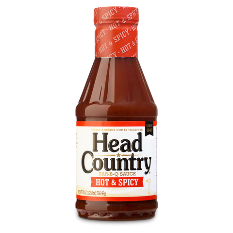 20 oz bottle of Head Country Hot BBQ Sauce, prominently labeled as Oklahoma's #1 BBQ sauce since 1947, perfect for adding a spicy kick to various dishes. This sauce is free from MSG, gluten, and allergens, ensuring a bold and clean flavor.
