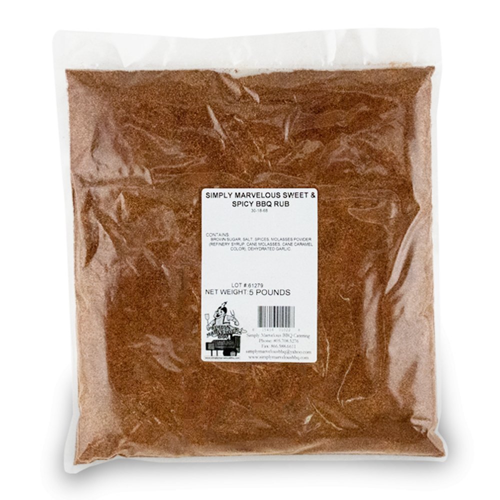 A large, clear plastic bag filled with a reddish-brown seasoning labeled 'Simply Marvelous Sweet & Spicy BBQ Rub.' The label lists ingredients including brown sugar, salt, spices, molasses powder, maple sugar, cane molasses, caramel, and dehydrated garlic. The net weight is 5 pounds. The label also features a barcode and the Simply Marvelous BBQ & Catering contact information.