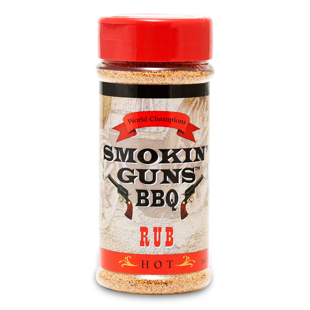 The front of a small container of Smokin' Guns BBQ Hot Rub with a red cap. The label features the brand name with two pistols and the words "World Champions" in a red ribbon above "Smokin' Guns BBQ Rub" and "Hot" at the bottom.