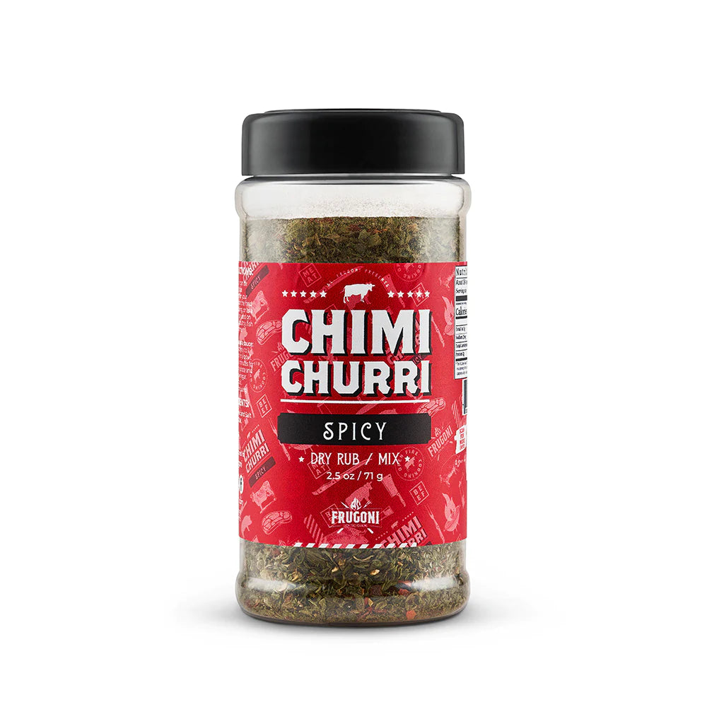 A jar of 'CHIMI CHURRI Spicy Dry Rub / Mix' with a red label, featuring various spices and herbs inside. The jar is standing upright on a white background.