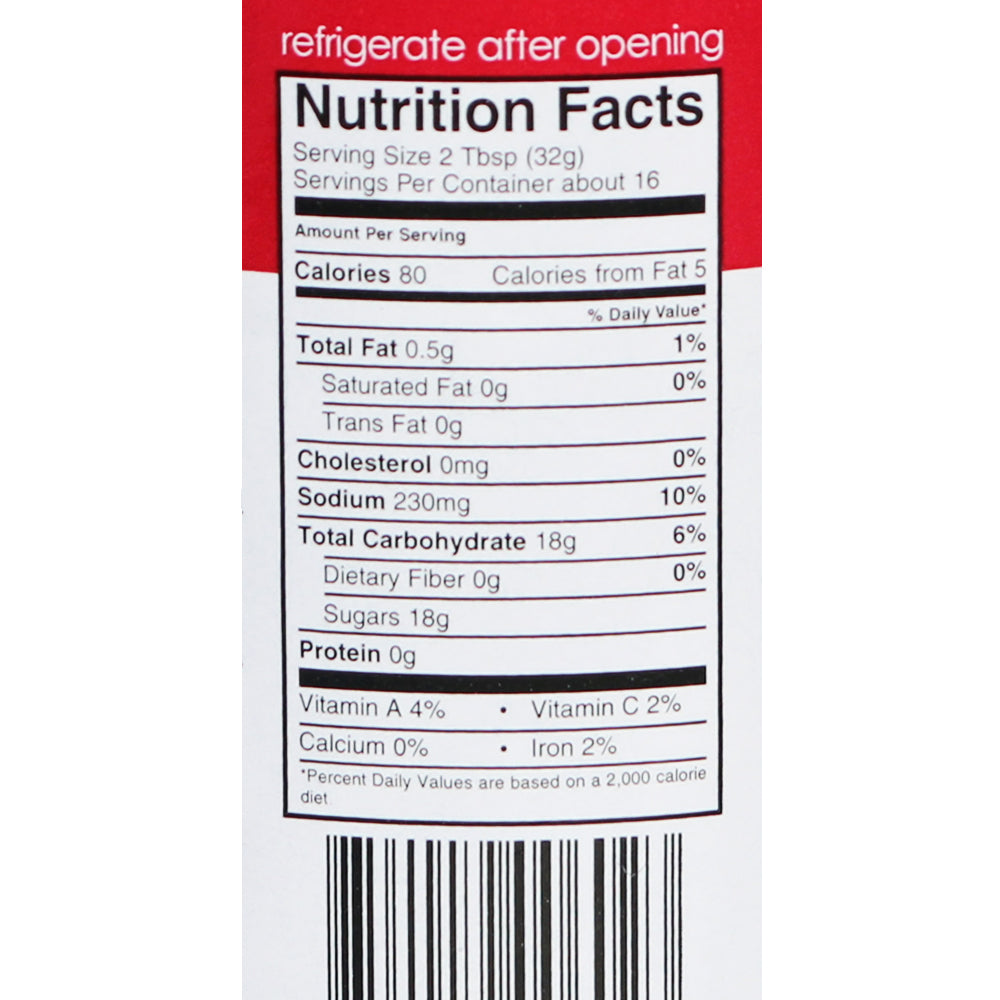 Bottle of Killer Hogs The BBQ Sauce, prominently displaying its label, ideal for adding a flavorful punch to any BBQ dish with its perfect blend of heat, sweetness, and tanginess. Great for both competitive and backyard BBQs.  Nutritional facts label showing.