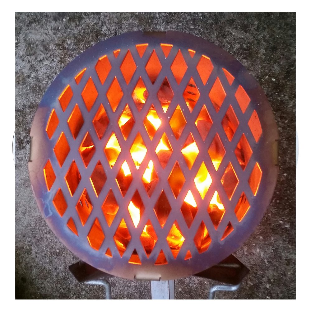 Unknown BBQ Chimney Griller, stainless steel accessory designed for grilling over a charcoal chimney, perfect for adding sear marks and enhancing BBQ flavor.  This is an overhead shot of the griller on top of the chimney with no food on it.