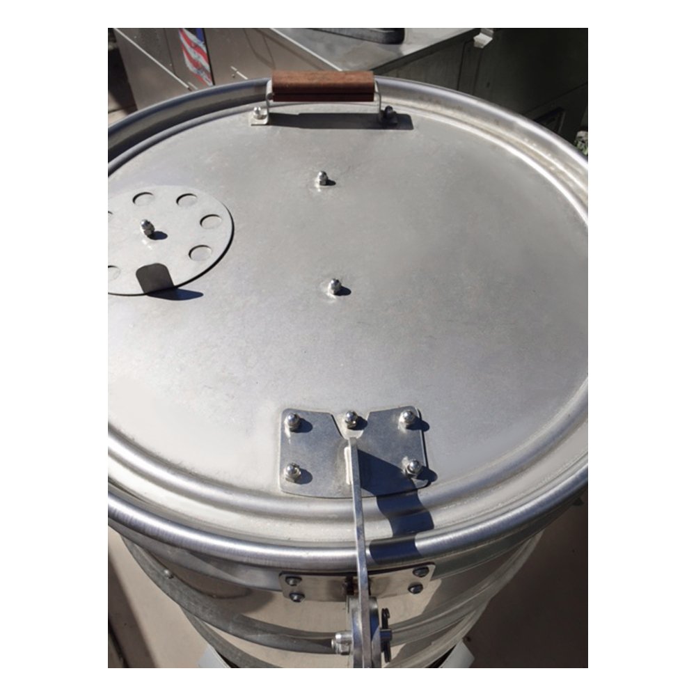 Close-up of Unknown BBQ Drum Smoker Lid Hinge on a 55-gallon drum smoker, showcasing its sturdy stainless steel construction and precise installation.  Image from atop of the smoker lid.